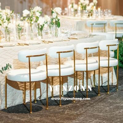 Guter Preis Stackbare Sherpa-Kissen Metall Hotel Hochzeit Bankett Restaurant Stuhl Weiß Stoff Polsterung Hochzeitsdekor Stühle Online