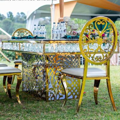 Guter Preis Luxushotel Esstisch aus Edelstahl mit Kristallanhänger, goldenem Glas, für Bankette, Restaurants und Partys Online